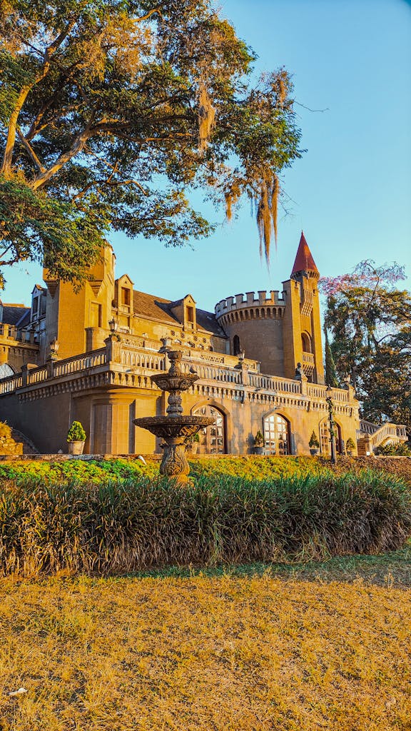 Striking view of El Castillo Museum in Medellín, showcasing its architecture at sunset.